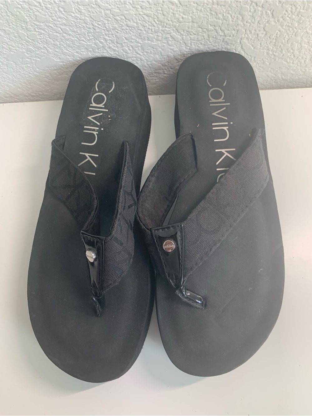 Calvin Klein Women’s Black Fabric Thong Sandals